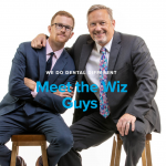 patterson dental wiz guys father and son posed on stools
