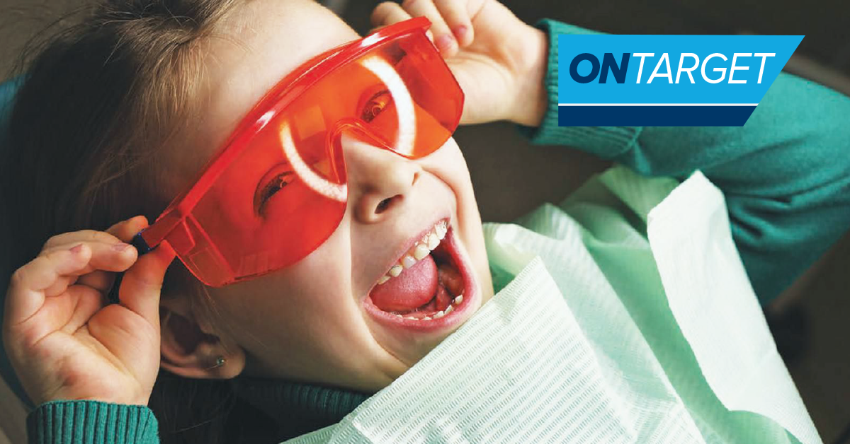 Pediatric dental patient with protective eyewear