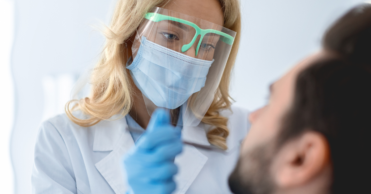 Stock photo of a dentist with a patient.