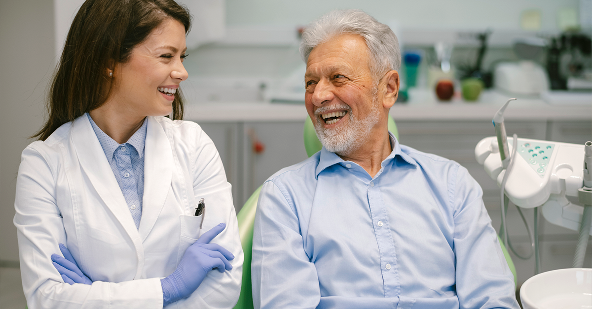 Stock photo of a dentist with her patient.